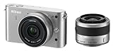 Nikon 1 J1 Systemkamera (10 Megapixel, 7,5 cm (3 Zoll) Display) silber inkl. 1 NIKKOR VR 10-30 mm...