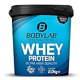 Protein-Pulver Bodylab24 Whey Protein Erdbeer mit weißen Chocolate Chunks 1kg, Protein-Shake für...